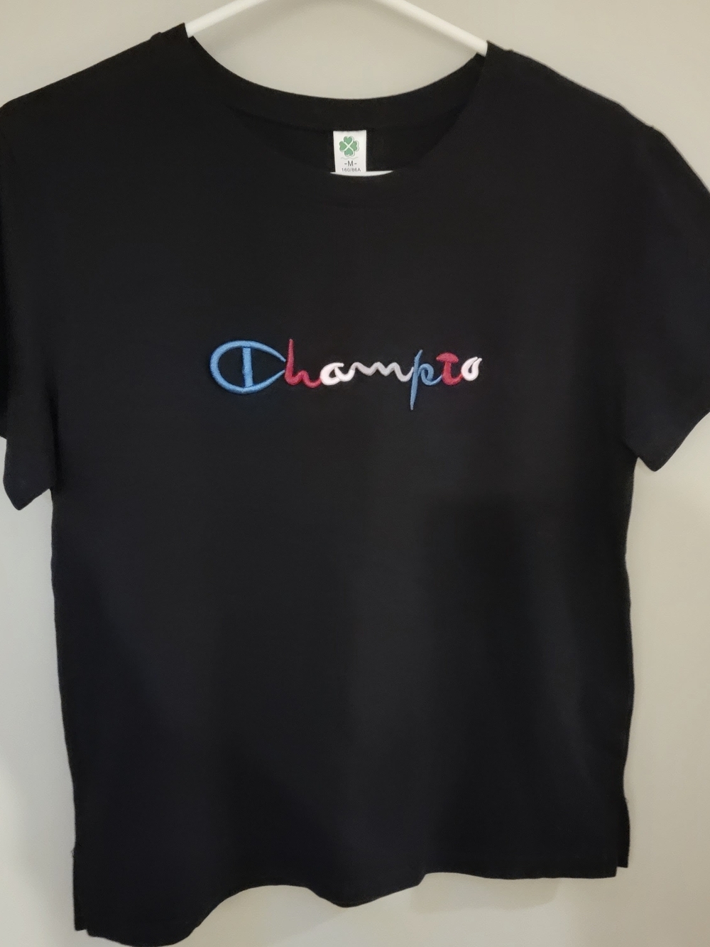 " Champion " Black Tee with Multicolor Stitched Mushroom Logo
